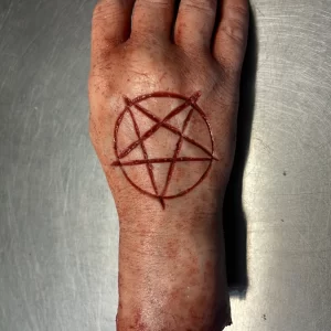 Severed Male Hand with Pentagram